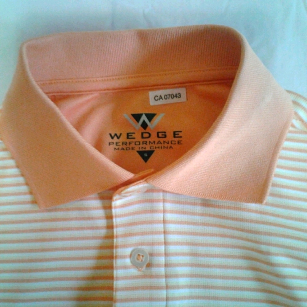 Men's performance short sleeve golf/polo size small never been used